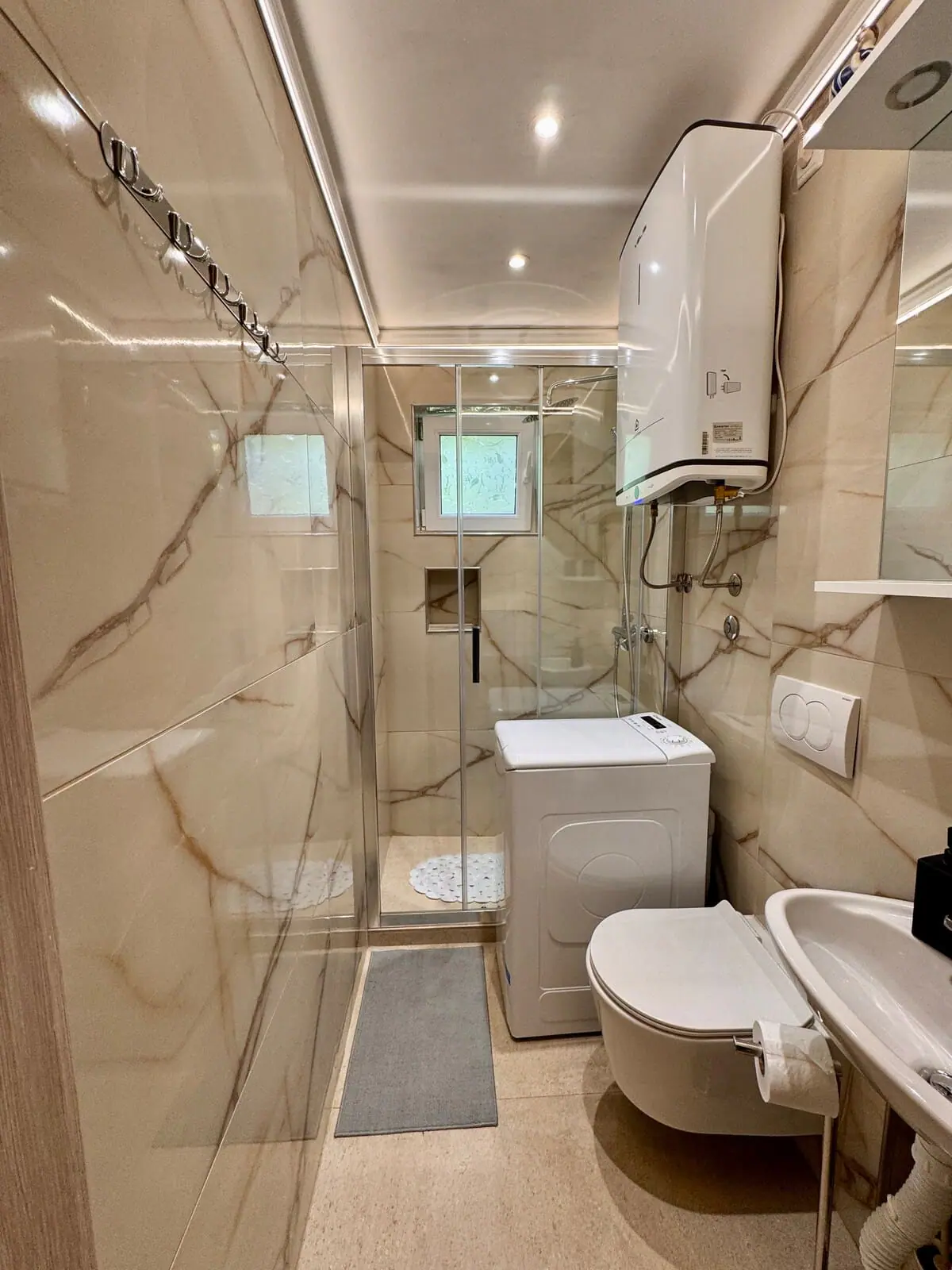 Marble bathroom with glass shower
